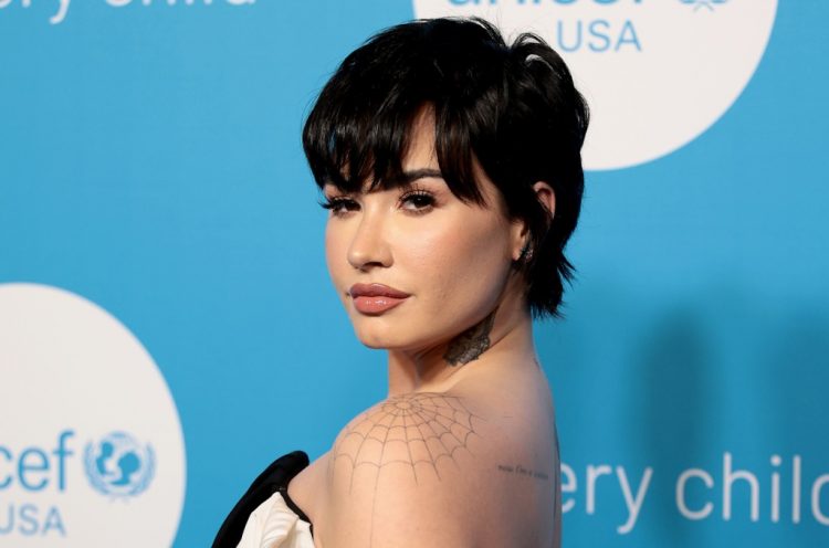 Demi Lovato’s ‘Holy Fvck’ Poster Banned in the U.K. for Being Offensive to Christians