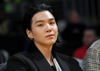 He’s Got Game: BTS’ Suga Sits Courtside at Lakers Match & Shows Off Custom Jersey