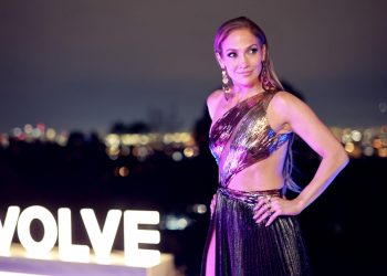 Jennifer Lopez Dazzles in Disco-Ready Metallic Gown With Thigh-High Slit