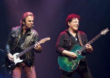 Feuding Journey members hire off-duty police to guard dressing rooms