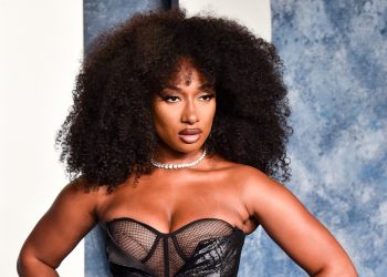 Megan Thee Stallion Addresses Tory Lanez Shooting in ‘Elle’ Cover: ‘I View Myself As a Survivor’