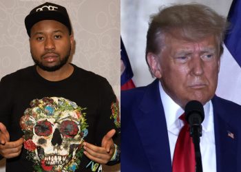 Akademiks takes a photo with Donald Trump at UFC fight
