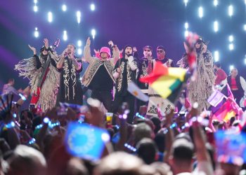 Ukraine’s Kalush Orchestra open Eurovision with emotive rendition of 2022 winning song
