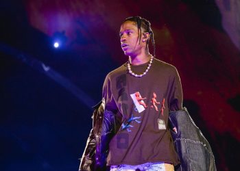 Travis Scott’s Bodyguard Seen With ‘Utopia’ Briefcase Handcuffed to His Wrist