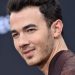 Kevin Jonas Had to Choose Between Demi Lovato & Miley Cyrus’ Music: Here’s What He Said