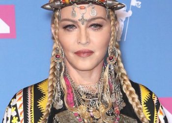 Madonna postpones tour after stay in ICU