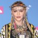 Madonna postpones tour after stay in ICU