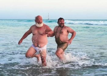 Tenacious D frolic on the beach for their cover of  ‘Wicked Game’