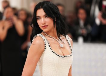 Dua Lipa Declares ‘Suns Out Huns Out’ in Sparkly Pink Bikini Photoshoot