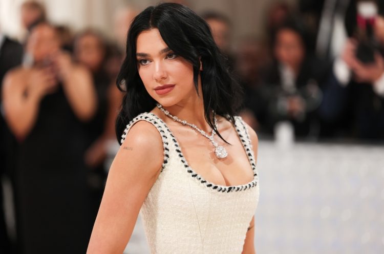 Dua Lipa Declares ‘Suns Out Huns Out’ in Sparkly Pink Bikini Photoshoot