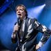 The Hives’ Pelle Almqvist cuts head while swinging microphone but finishes gig