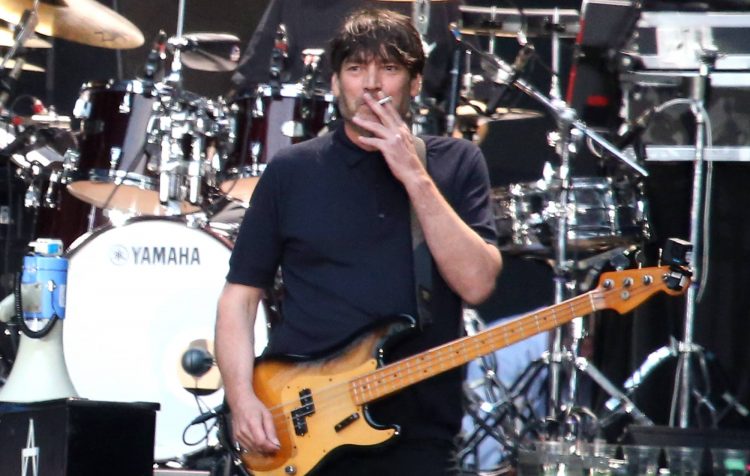 Watch Blur’s Alex James play ‘Vindaloo’ at Wembley Stadium