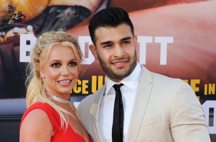 Video Appears to Show Britney Spears Inadvertently Hitting Herself in Face During Wembanyama Encounter