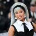 Cardi B Sings ‘I Will Always Love You’ With Busker in Paris