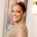 Jennifer Lopez Enjoys the Fourth of July Lounging in Pink Swimsuit