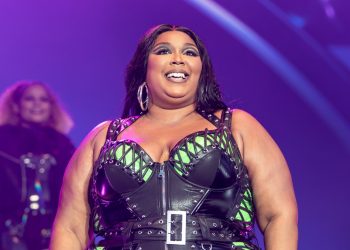 Lizzo Reacts to Fan Holding ‘I Chose You Over Taylor Swift’ Sign at Australia Concert