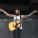 Post Malone Stops Traffic in Times Square to Deliver Surprise Performance at Newly-Built TSX Stage
