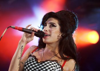 Amy Winehouse Is Alone in a Crowd in New ‘Tears Dry On Their Own’ Video Featuring Unseen Footage