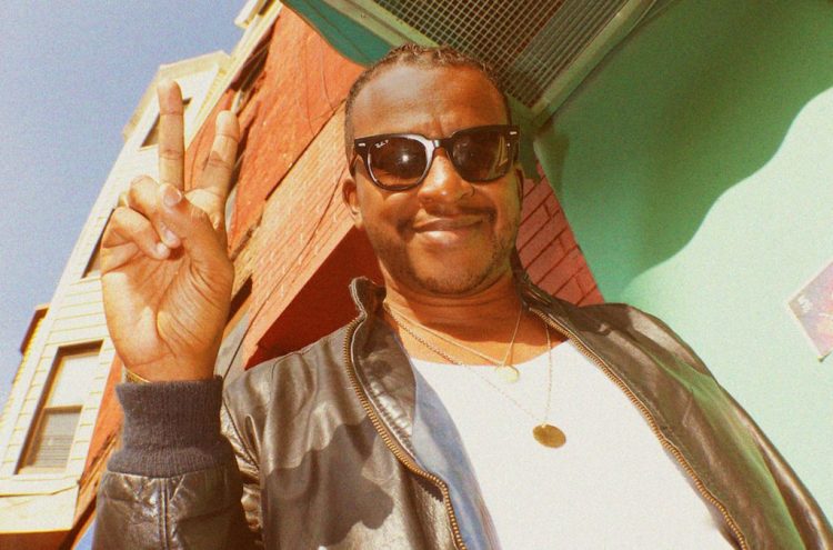 Sinkane’s New World: The Sudanese-American Musician Talks New ‘We Belong’ LP & Honoring the Black Musical Diaspora 