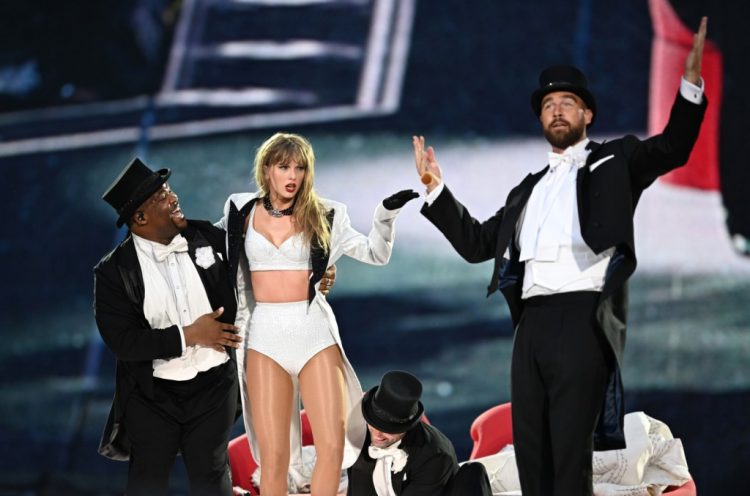 Taylor Swift Appears to Light Up After Spotting Boyfriend Travis Kelce in Audience of Dublin Eras Tour Show