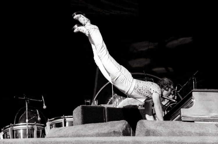 Sir Elton John’s 50-Year Career Honored With Gravity-Defying Keyboard Handstand Figure at Madame Tussauds London